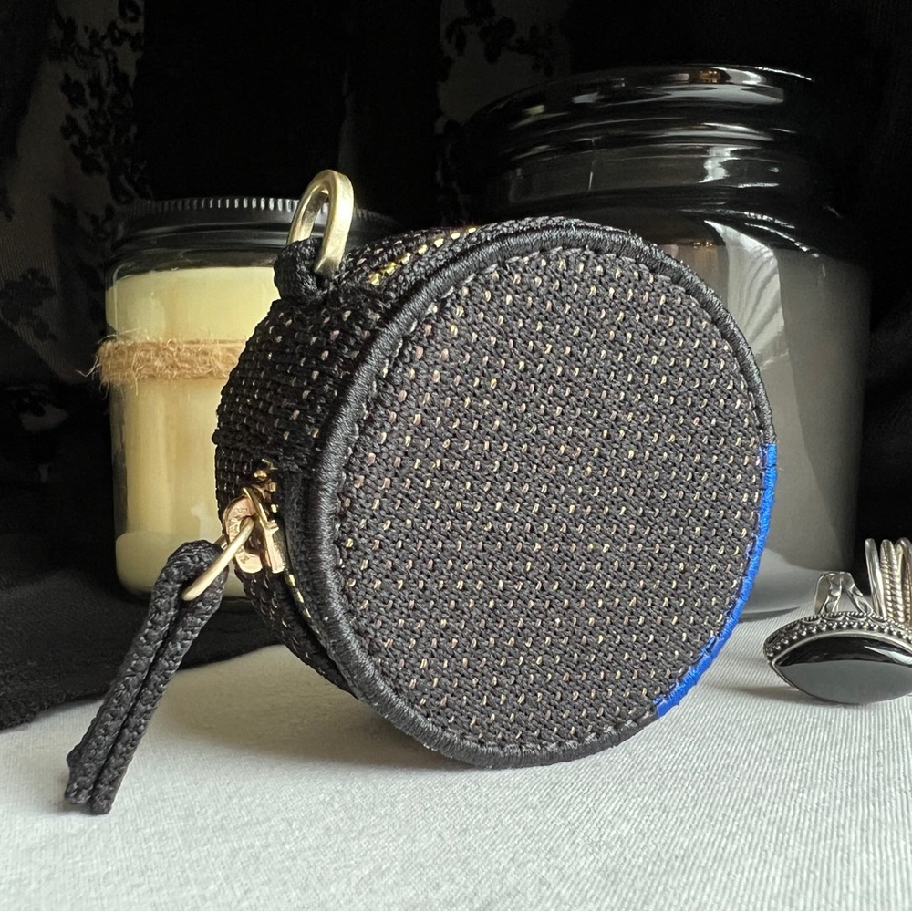 ROTHY’S ‘The Round Pouch” in Black and Gold